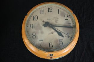 Magneta Electric London. Wall clock. Mains power supply operated. 200 250v. Probably 1940's but