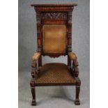 Throne chair, early 19th century carved oak with sabre lion's paw supports. H.149 W.76 D.74cm.