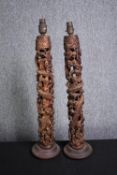 A pair of carved table lamps. Probably Indonesian. H.63 cm. (each)