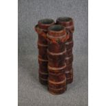 Three World War One moulded leather artillery shell cases. Each lined with lead. Bound by a