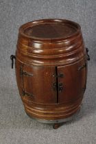 Cupboard, vintage Continental oak in the form of a barrel. H.62 Dia.40cm.