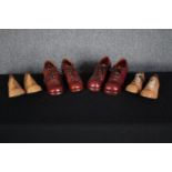 Anthony F. Richardson. Two pairs of 1970s platform high heeled shoes with their shoe trees made