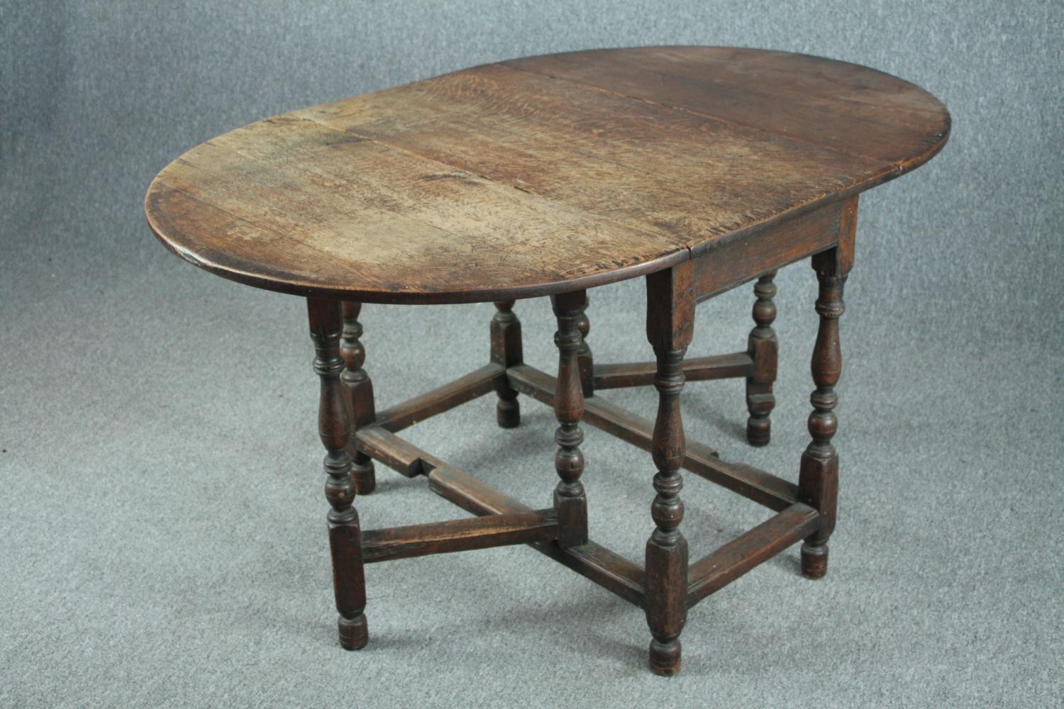 Dining table, mid century oak in the antique style. H.72 W.137 D.92cm. (extended) - Image 4 of 7