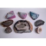 A collection of eight agate Geodes and slices, three died pink and blue. H.19 W.15cm. (largest)