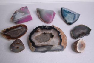 A collection of eight agate Geodes and slices, three died pink and blue. H.19 W.15cm. (largest)
