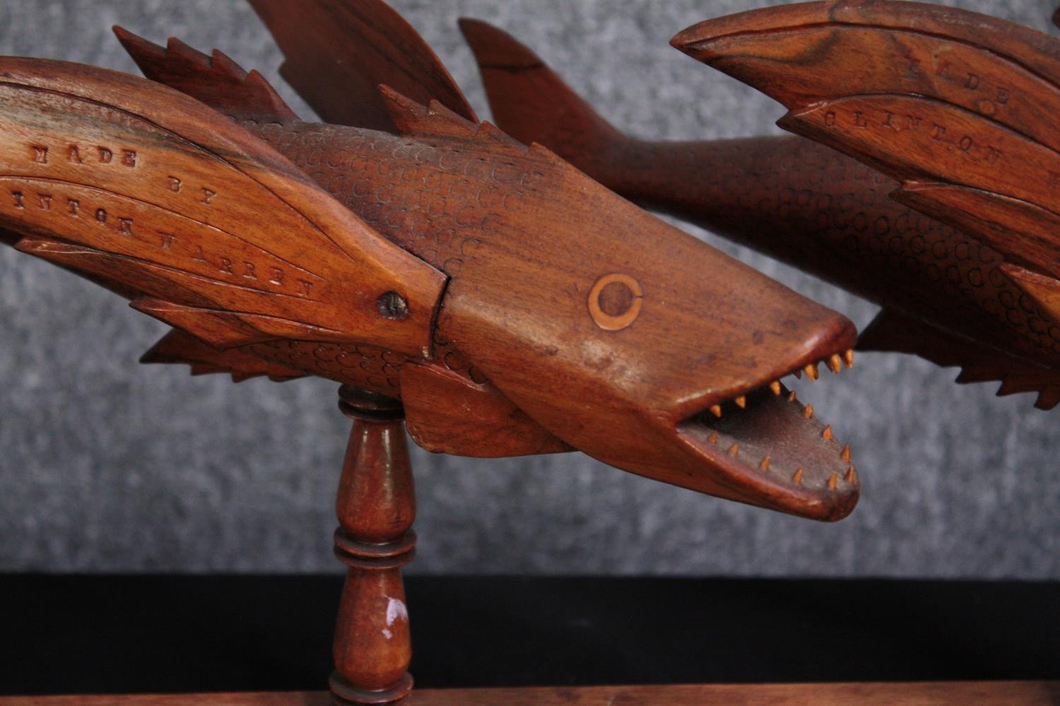 Two carved fish ornaments. Three fish mounted on a wooden stand, stamped Made by Clinton Warren, the - Image 4 of 8