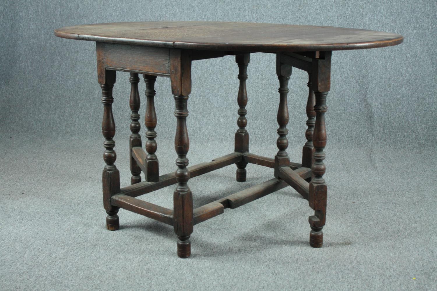 Dining table, mid century oak in the antique style. H.72 W.137 D.92cm. (extended) - Image 6 of 7