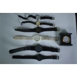 A collection of watches and a small mantel clock. H.6 W.6 D.3cm.