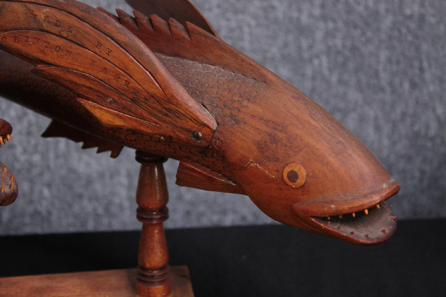 Two carved fish ornaments. Three fish mounted on a wooden stand, stamped Made by Clinton Warren, the - Image 3 of 8