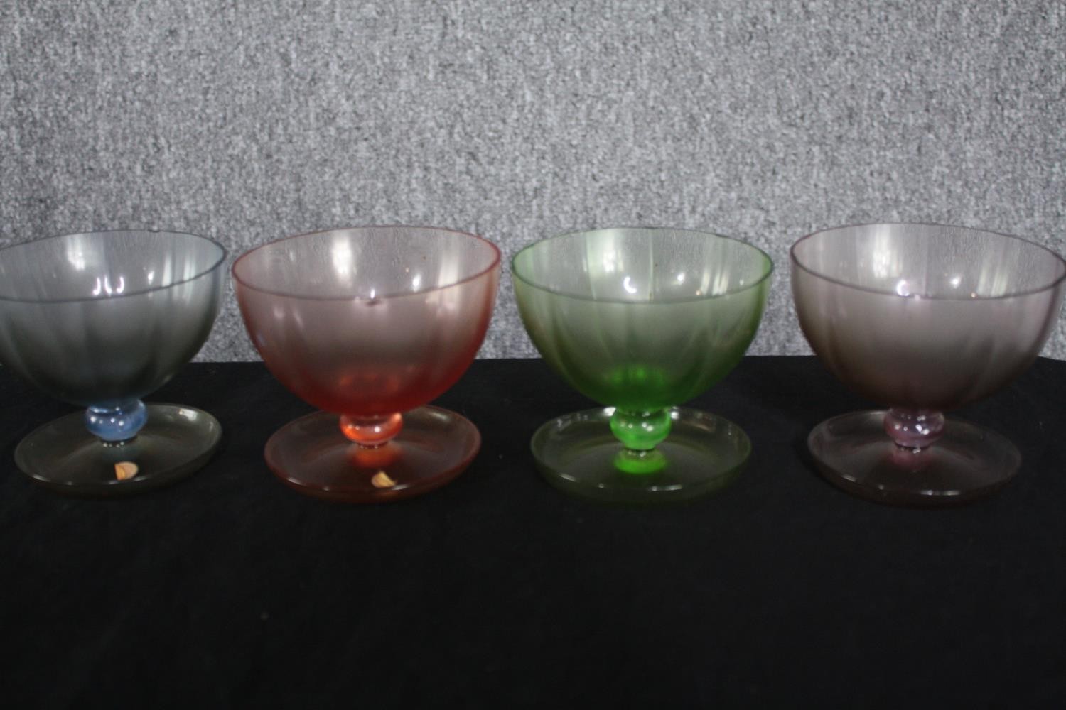 A mixed collection of coloured stemmed glass. Including wine, sherry and cocktail glasses. The - Image 3 of 4