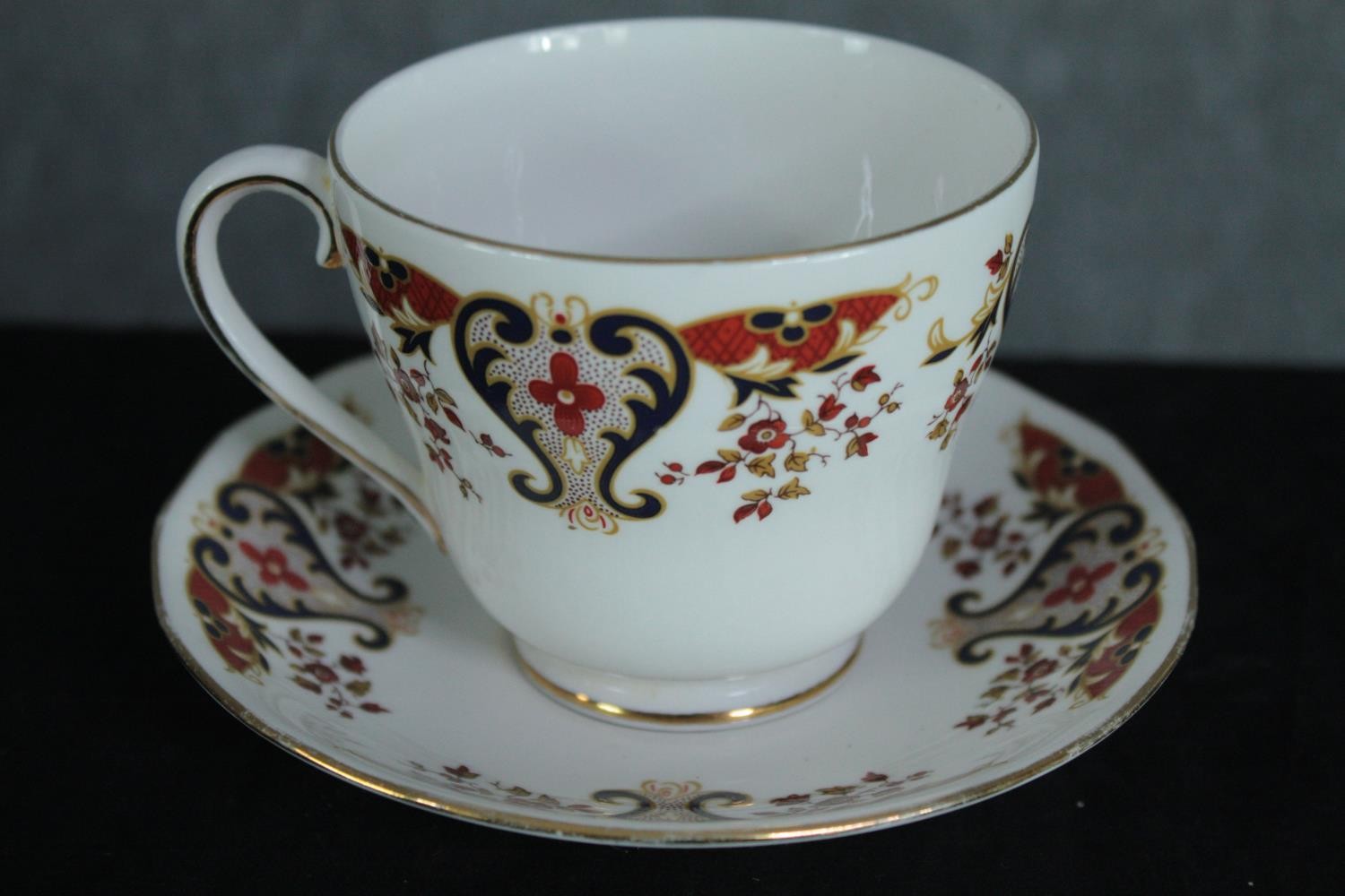 A Colclough six person coffee set with stylised floral design and gilded edging. Dia.15cm. (largest) - Image 3 of 6