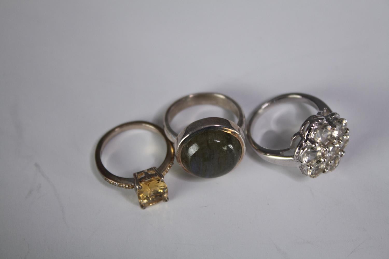A collection of ten silver gem-set rings of various designs. Set with Fire opal, amber, amethyst and - Image 2 of 4