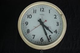 Mid century British office wall clock made by Genalex. 1950's but maybe earlier. Mains operated