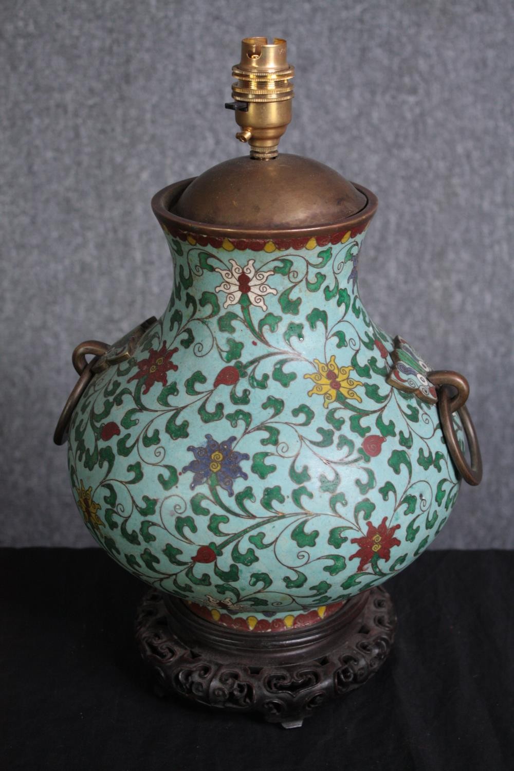 A Chinese cloisonne enamel twin handled vase converted into a lamp. With two brass handles.