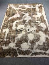 A Persian style carpet with faux ageing pattern. L.204 W.193cm.