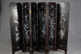 Screen or room divider, five fold and six panels, Chinese lacquered with profuse allover figural,