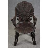 Grotto chair, 19th century Venetian style with allover bird and foliate carving. H.87cm.