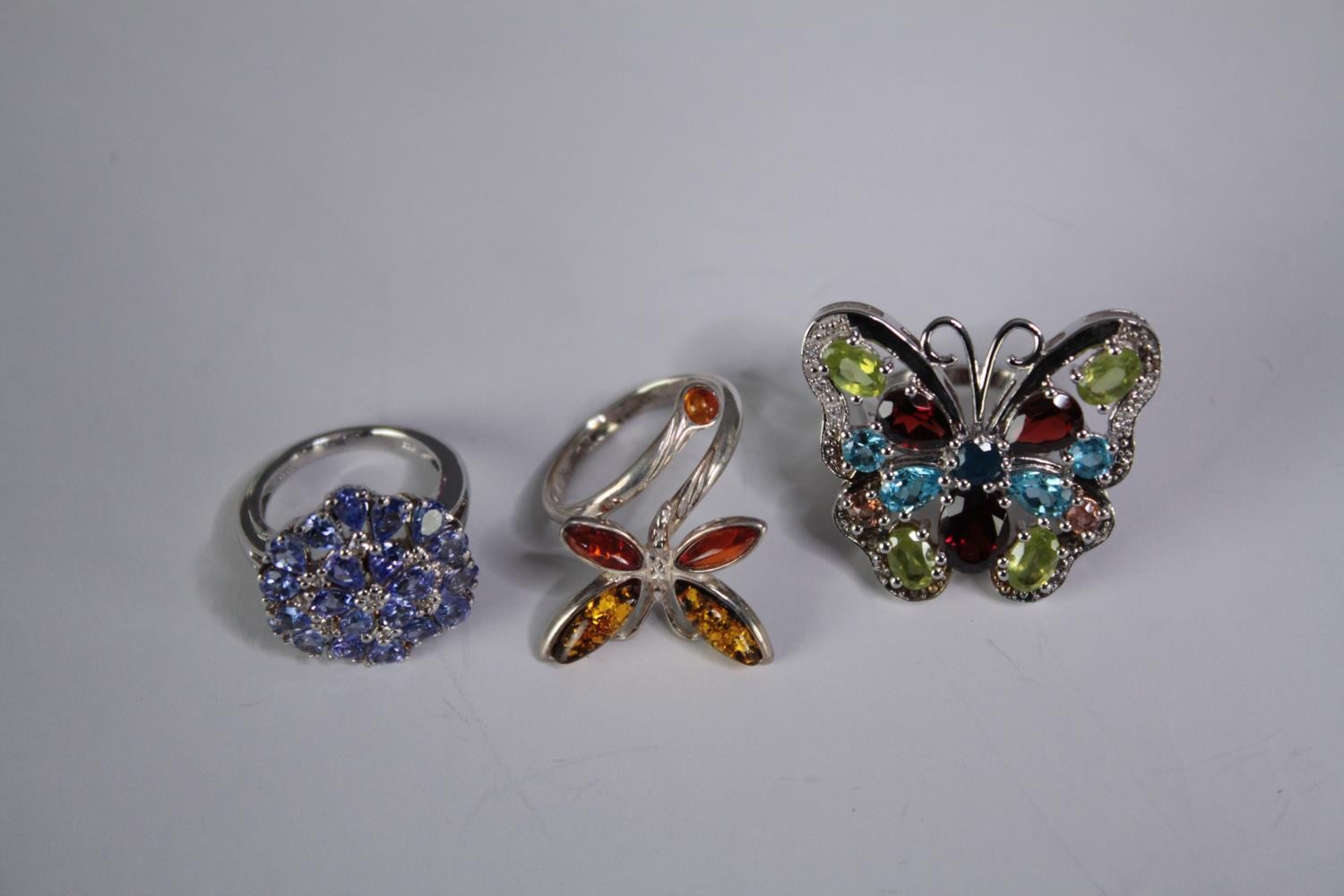 A collection of ten silver gem-set rings of various designs. Set with peridot, Turquoise and blue - Image 3 of 4