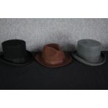 Two top hats and a Homburg. The black top hat made by PJ Powell. Size large, medium and size 7.