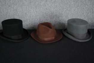 Two top hats and a Homburg. The black top hat made by PJ Powell. Size large, medium and size 7.