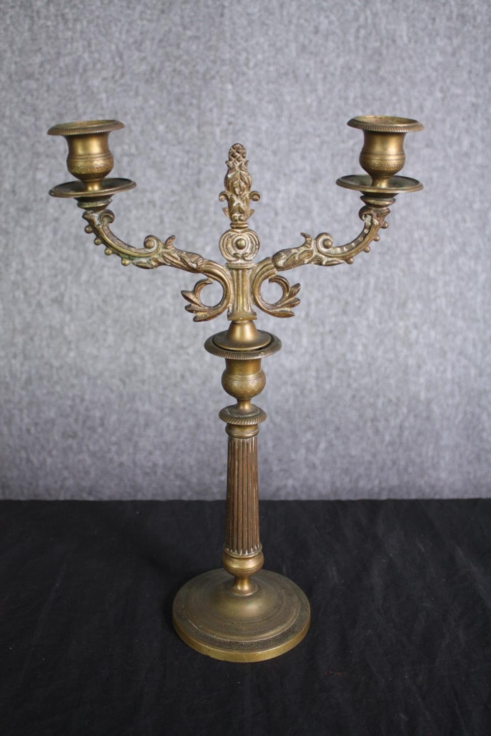 A pair of brass candle holders. Probably late nineteenth century. H.37cm. (each) - Image 2 of 5
