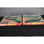 Two Mehano train sets. Continental goods. H.58 W.37cm. (each)
