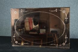 Wall mirror, mid century etched peach glass. H.50 W.77cm.