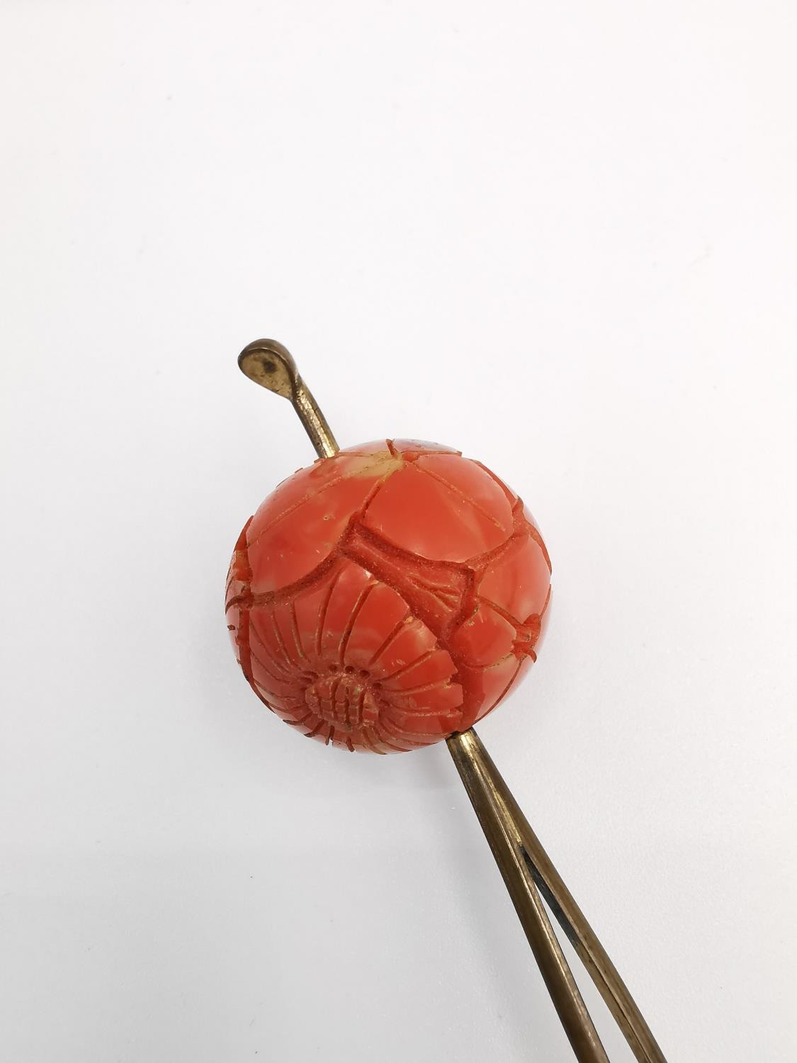 An orange velvet cased 1930s carved coral Bakelite floral design Kanzashi hair pin and string of - Image 4 of 12