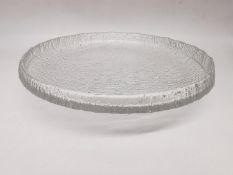 Tapio Wirkkala, Iittala - A post war Ultima Thule clear glass bowl of shallow circular form relief