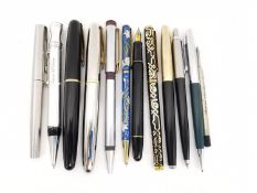 A collection of eleven vintage ballpoint and fountain pens, including two Japanese Tombow