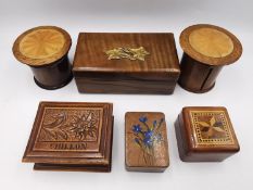 A collection of 19th and early 20th century treen stamp and trinket boxes, including one with