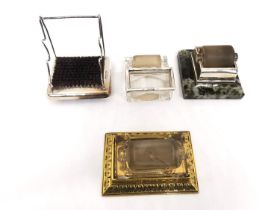 A collection of early 20th century stamp water rollers and a Victorian silver pen stand and wipe.