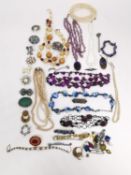 A collection of vintage jewellery, including an amethyst chips necklace with amethyst pendant, a