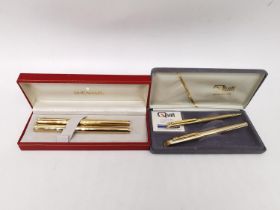 Two cased sets of vintage fountain pens, including a gold plated Schaeffer set with gold plated nibs
