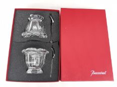 A boxed set of Baccarat crystal lidded mustard pots with spoons. All pieces stamped with makers