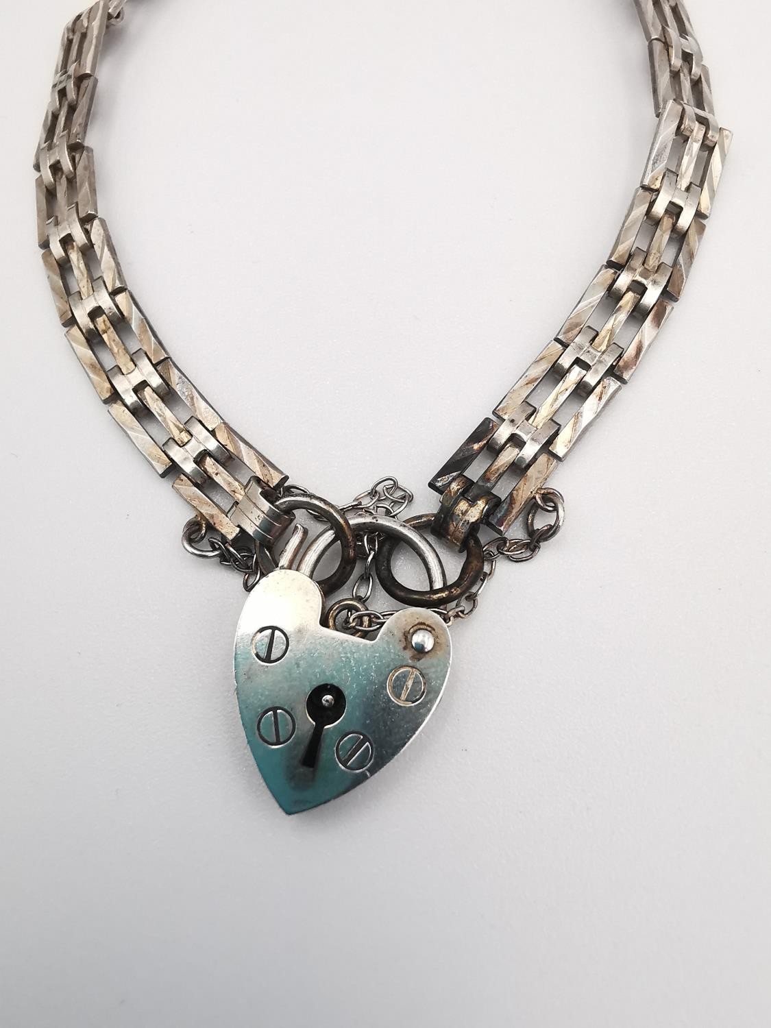 Two silver charm bracelets. One with a bar gate link chain and heart padlock clasp with safety - Image 3 of 8