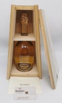 A limited edition 2013 Ruinart Champagne Brut bottle in reclaimed wood case designed by Piet Hein