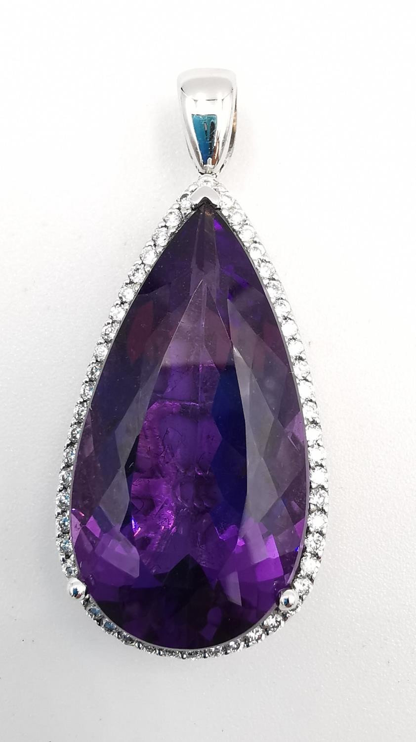 A contemporary 18ct white gold amethyst and diamond statement drop pendant. The pendant set with a - Image 2 of 7