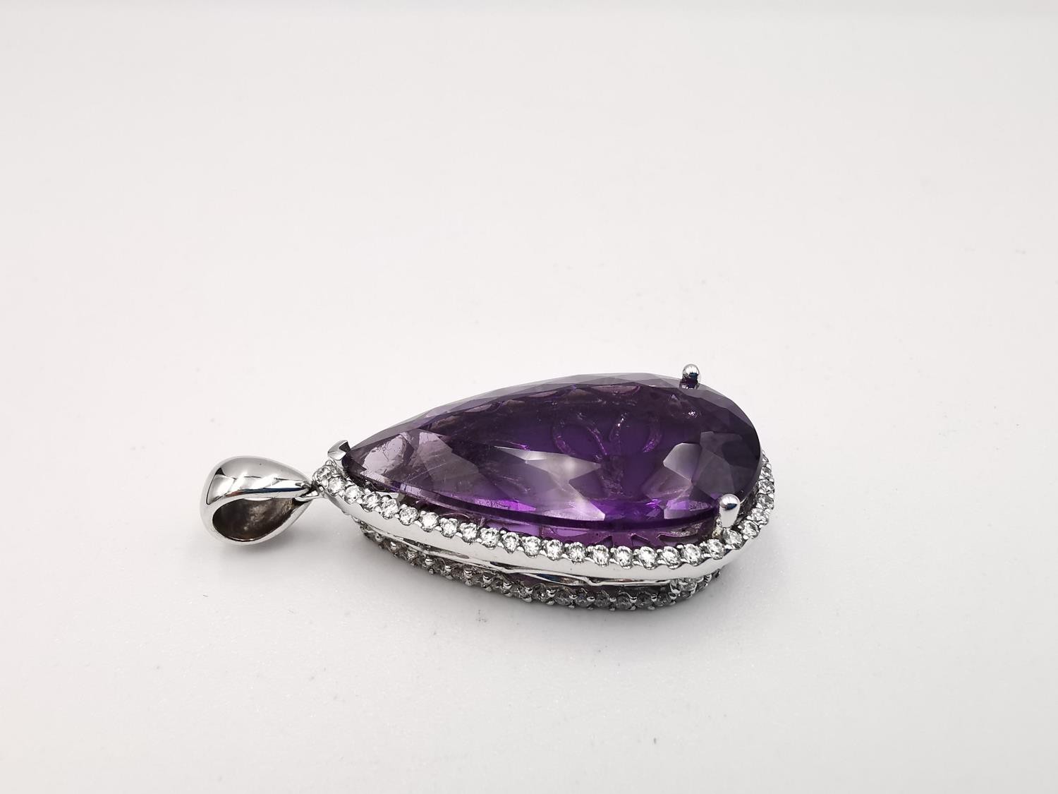A contemporary 18ct white gold amethyst and diamond statement drop pendant. The pendant set with a - Image 3 of 7