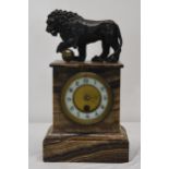 A 19th century marble mantel clock with a bronze Medici lion surmount. H.37 W.17 D.13