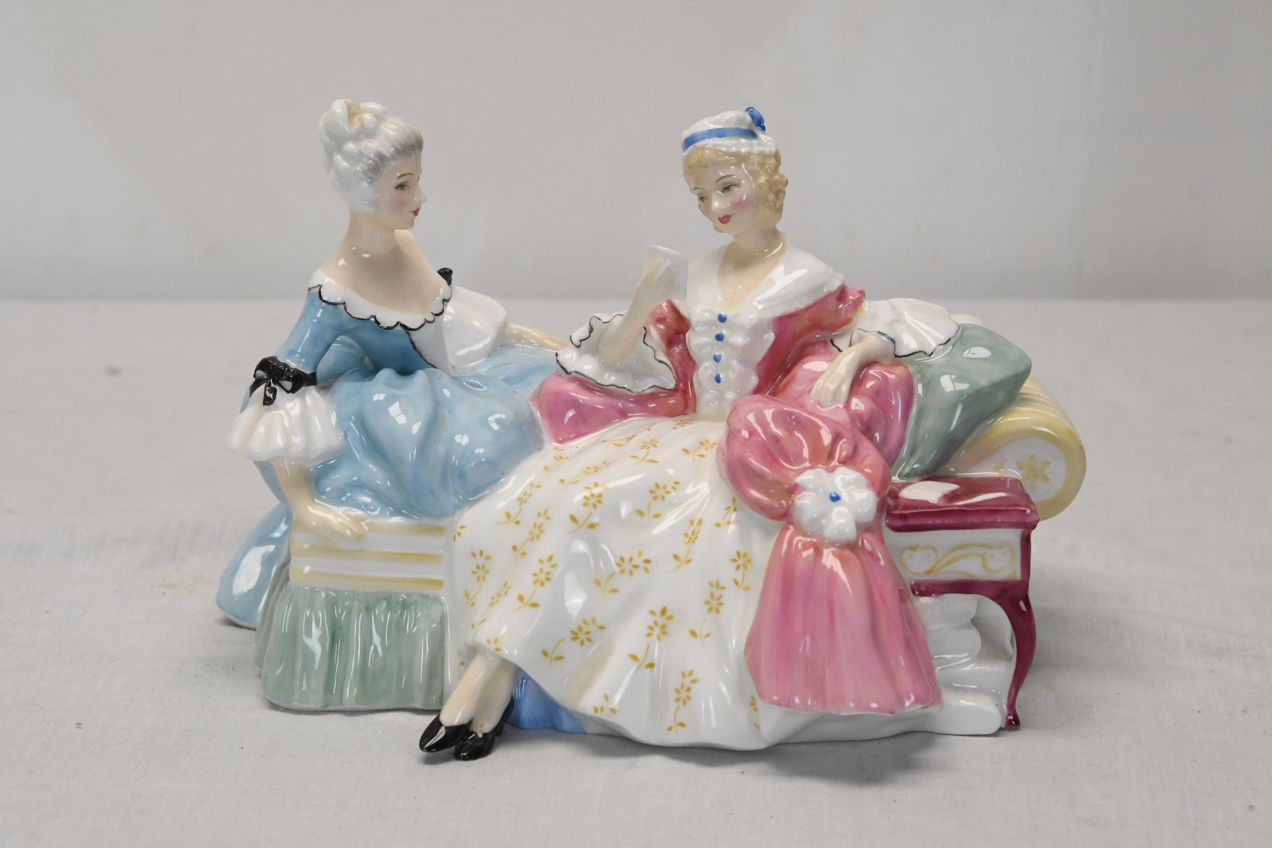 A Royal Doulton figure group, Love Letters. H.20 W.14 D.14