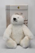 A boxed Steiff bear, Polar Ted. Bear is 30cm high