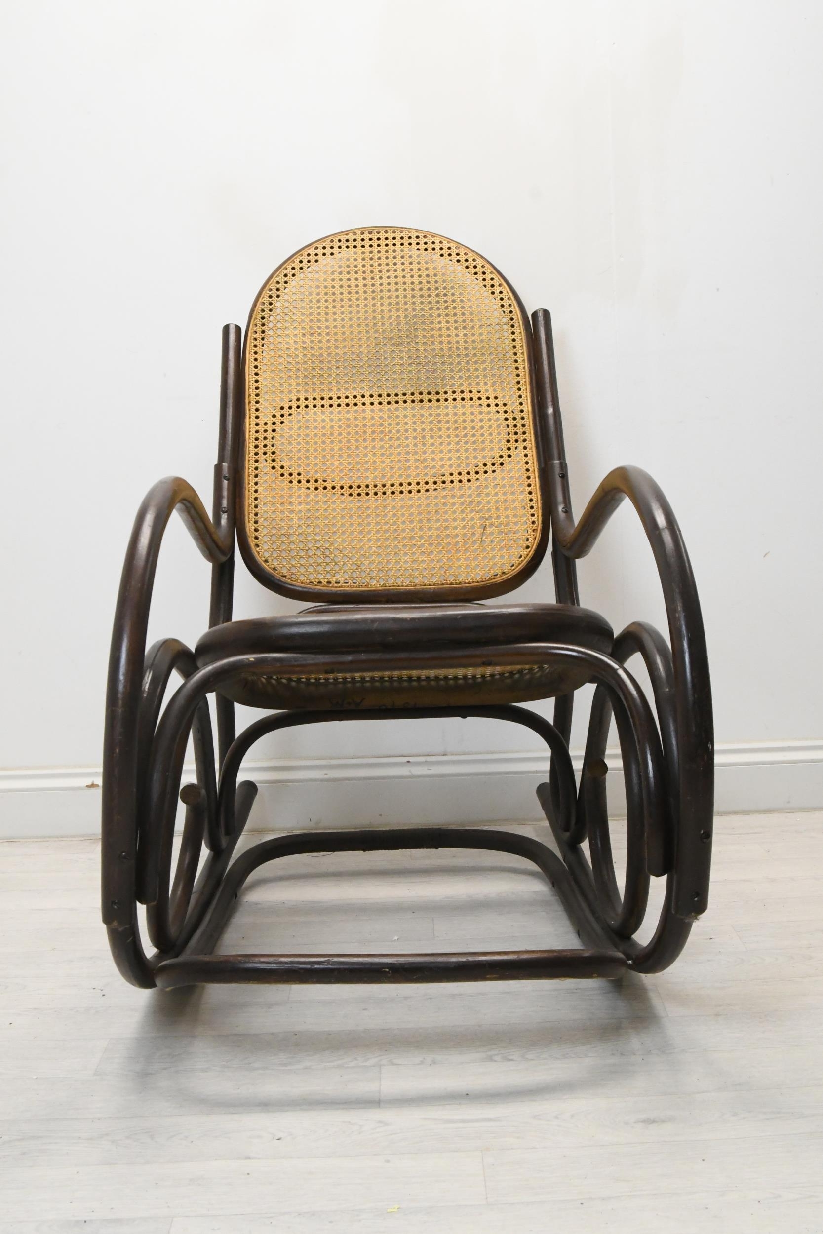 A vintage bentwood rocking chair with caned back and seat. H.110 W.55 D.110 - Image 3 of 4