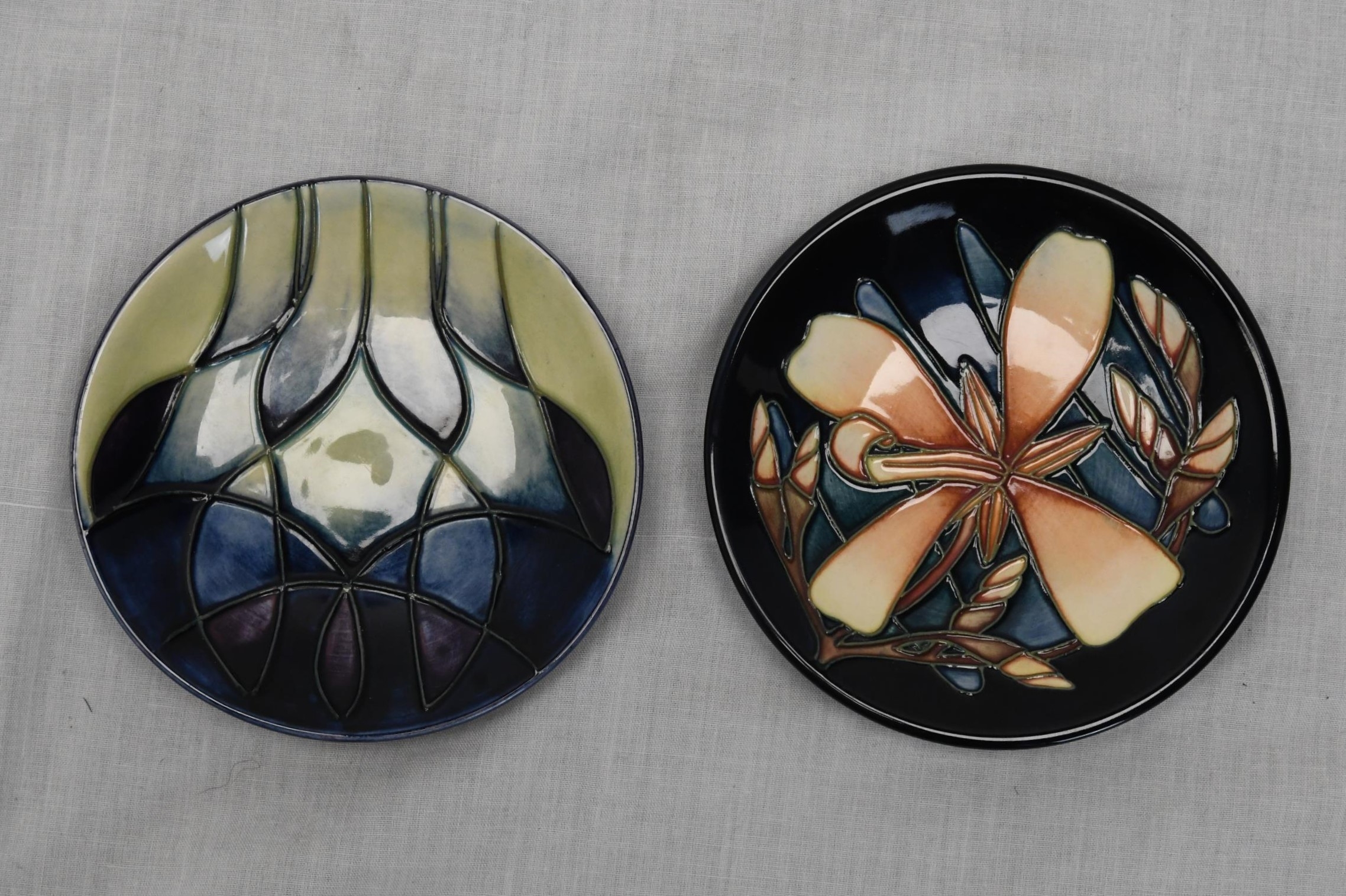 Two Moorcroft dishes. 12cm diameter