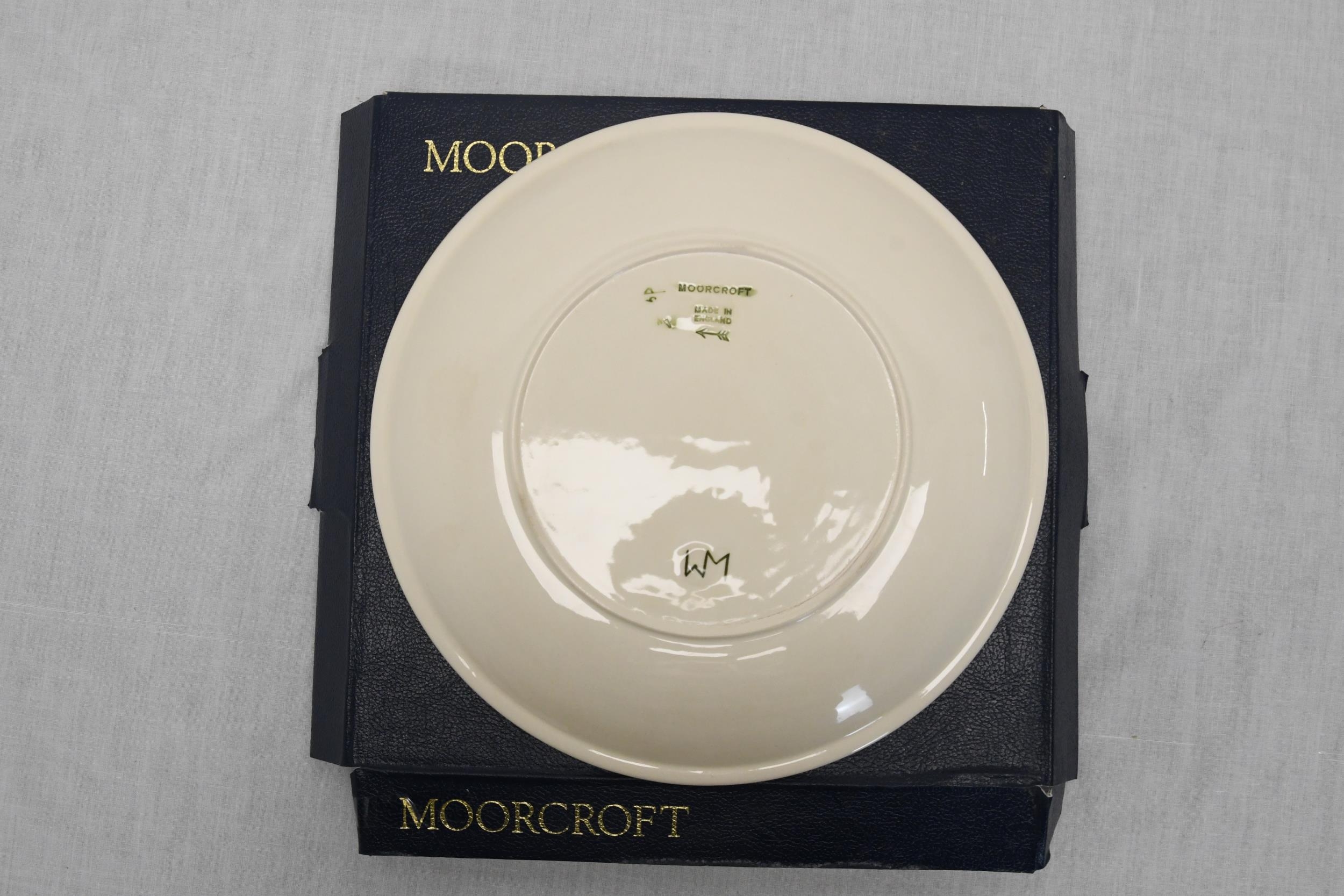 A large Moorcroft plate, boxed. 26cm diameter - Image 2 of 3