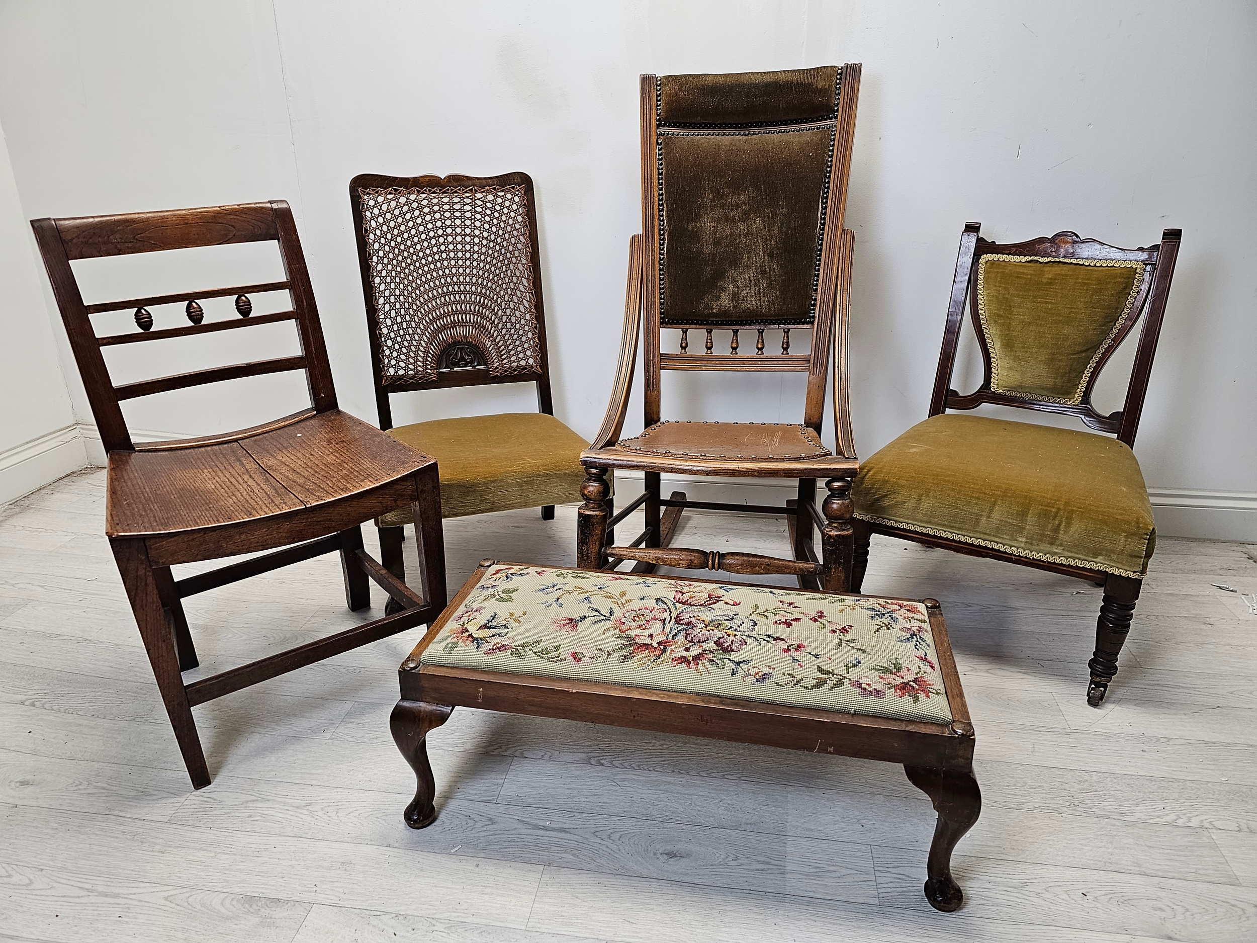 A miscellaneous collection of 19th century chairs along with a tapestry upholstered footstool.