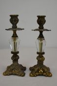 A pair of vintage brass and glass candlesticks. H.21