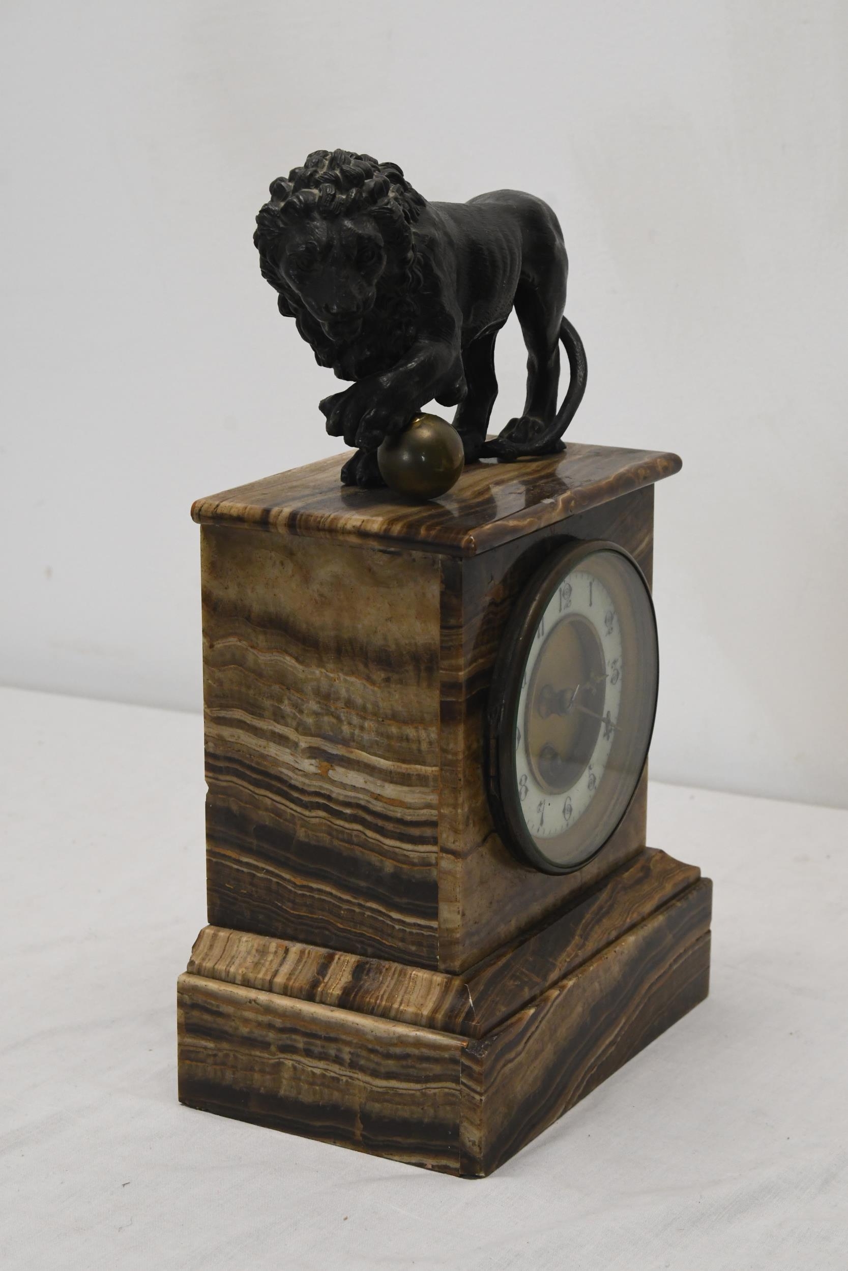 A 19th century marble mantel clock with a bronze Medici lion surmount. H.37 W.17 D.13 - Image 2 of 3