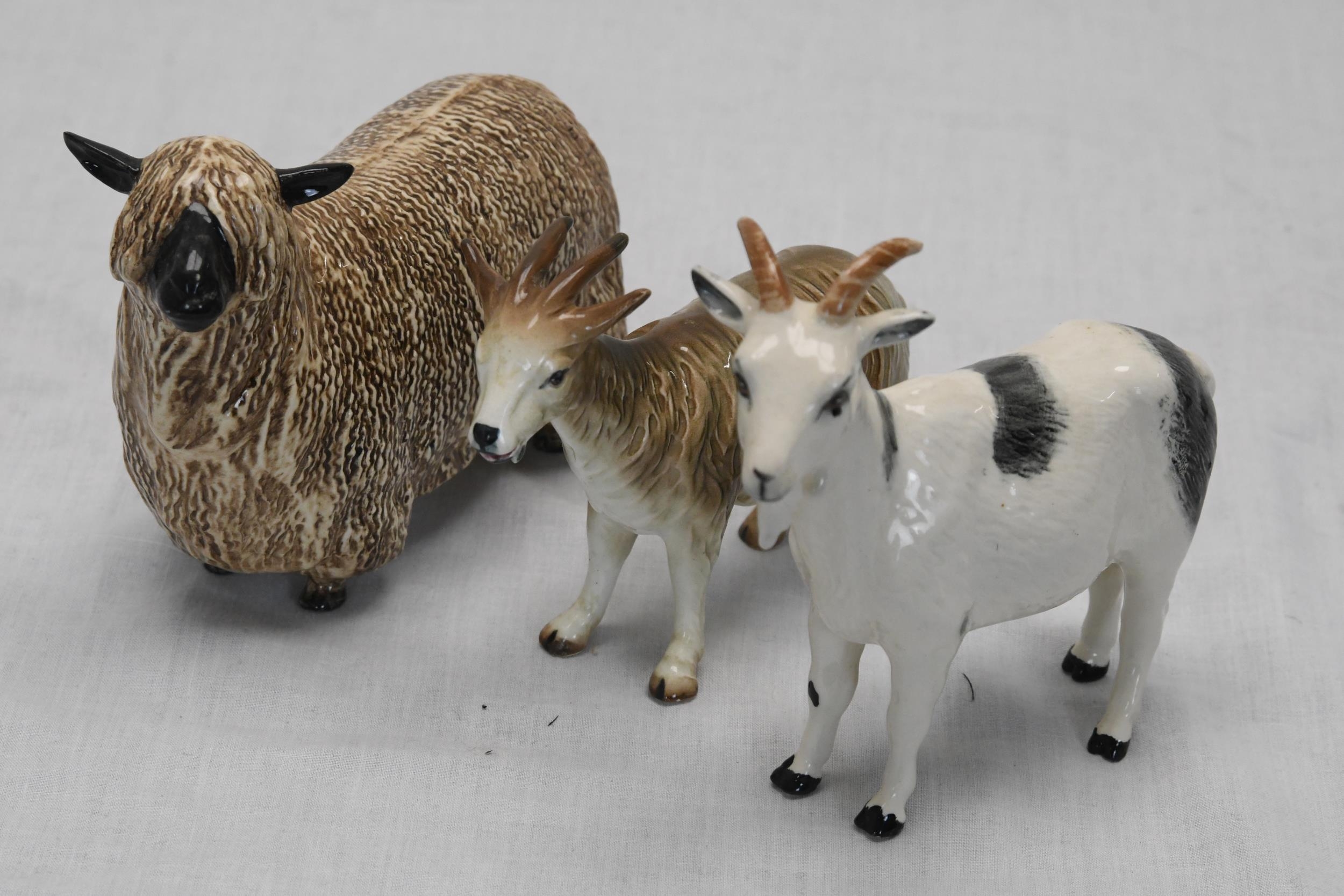 Three Beswick farm animals.