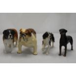 A collection of Beswick ceramic dogs.